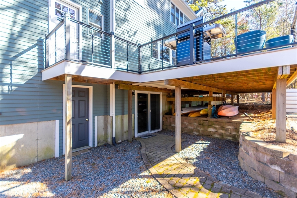2 Blackmore Pond Circle Wareham, MA 02576 - Photo 38 of 42 a view of a house with a patio
