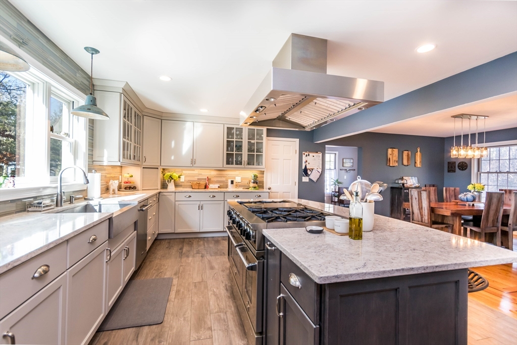 2 Blackmore Pond Circle Wareham, MA 02576 - Photo 8 of 42 a kitchen with a stove window and cabinets