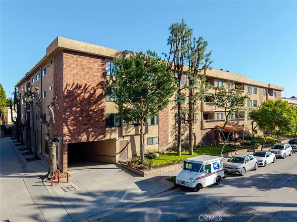 a front view of a building with street view