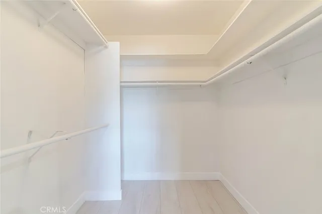a bathroom with a sink double vanity and a mirror