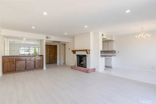 a bathroom with a granite countertop sink a mirror and a