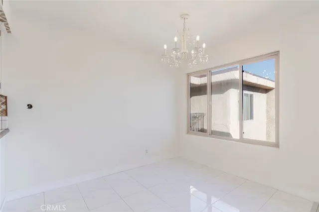 a bedroom with a bed and a fireplace