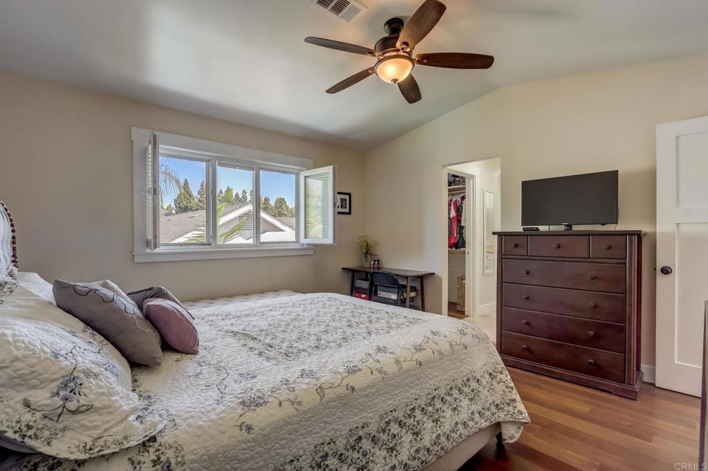 2035 Waterbury Chula Vista, CA 91913 - Photo 11 of 26 a bedroom with a bed and a flat screen tv