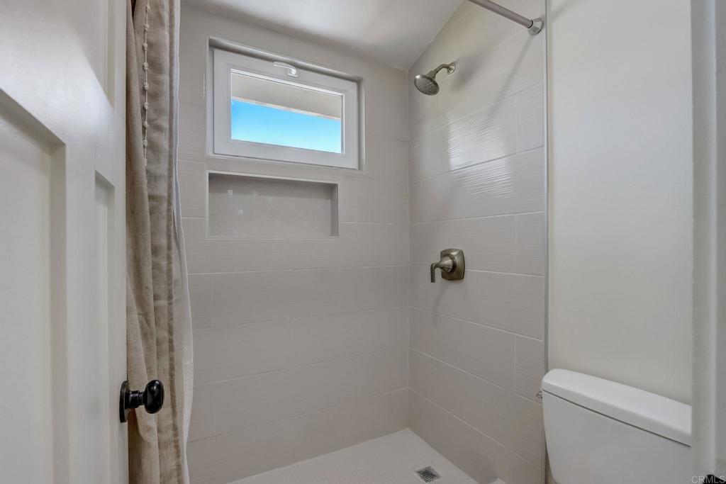2035 Waterbury Chula Vista, CA 91913 - Photo 13 of 26 a bathroom with a shower