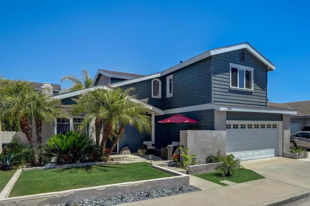2035 Waterbury Chula Vista, CA 91913 - Photo 2 of 26 a front view of a house with a yard
