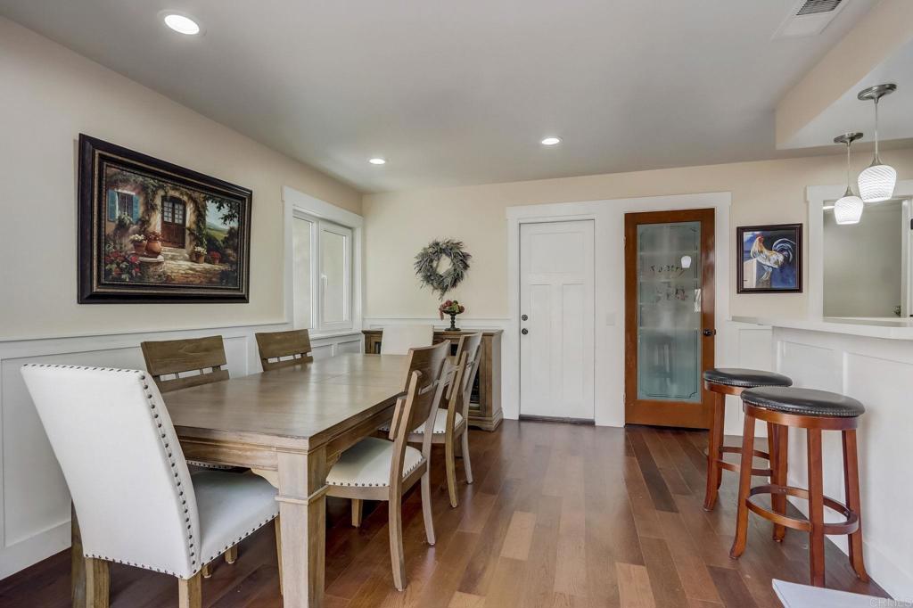 2035 Waterbury Chula Vista, CA 91913 - Photo 8 of 26 a view of a dining room with furniture and wooden floor