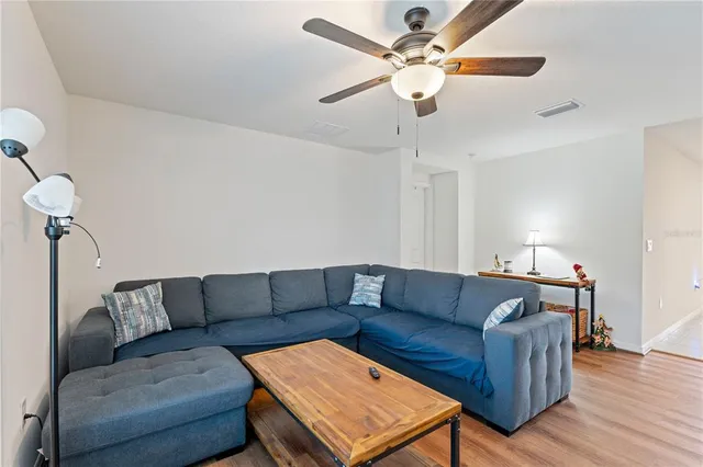 a living room with furniture and a couch