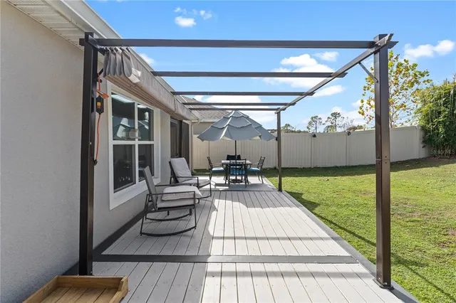 a view of swimming pool with a patio