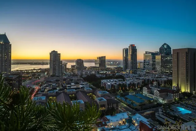 a view of a city with tall buildings