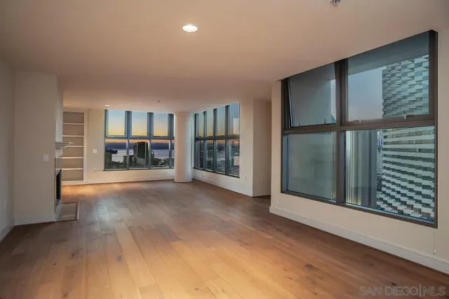 a view of livingroom with furniture and a fireplace