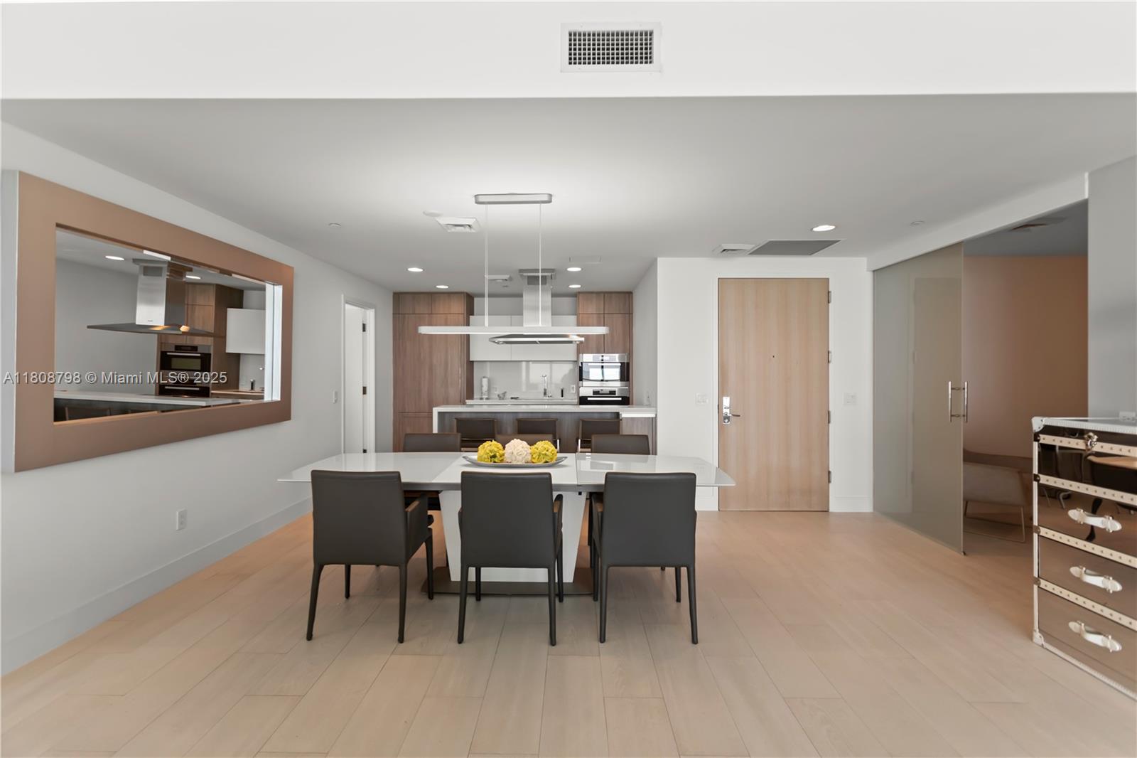 350 Ocean Drive, Unit 904N Key Biscayne, FL 33149 - Photo 11 of 41 a view of a dining room with furniture