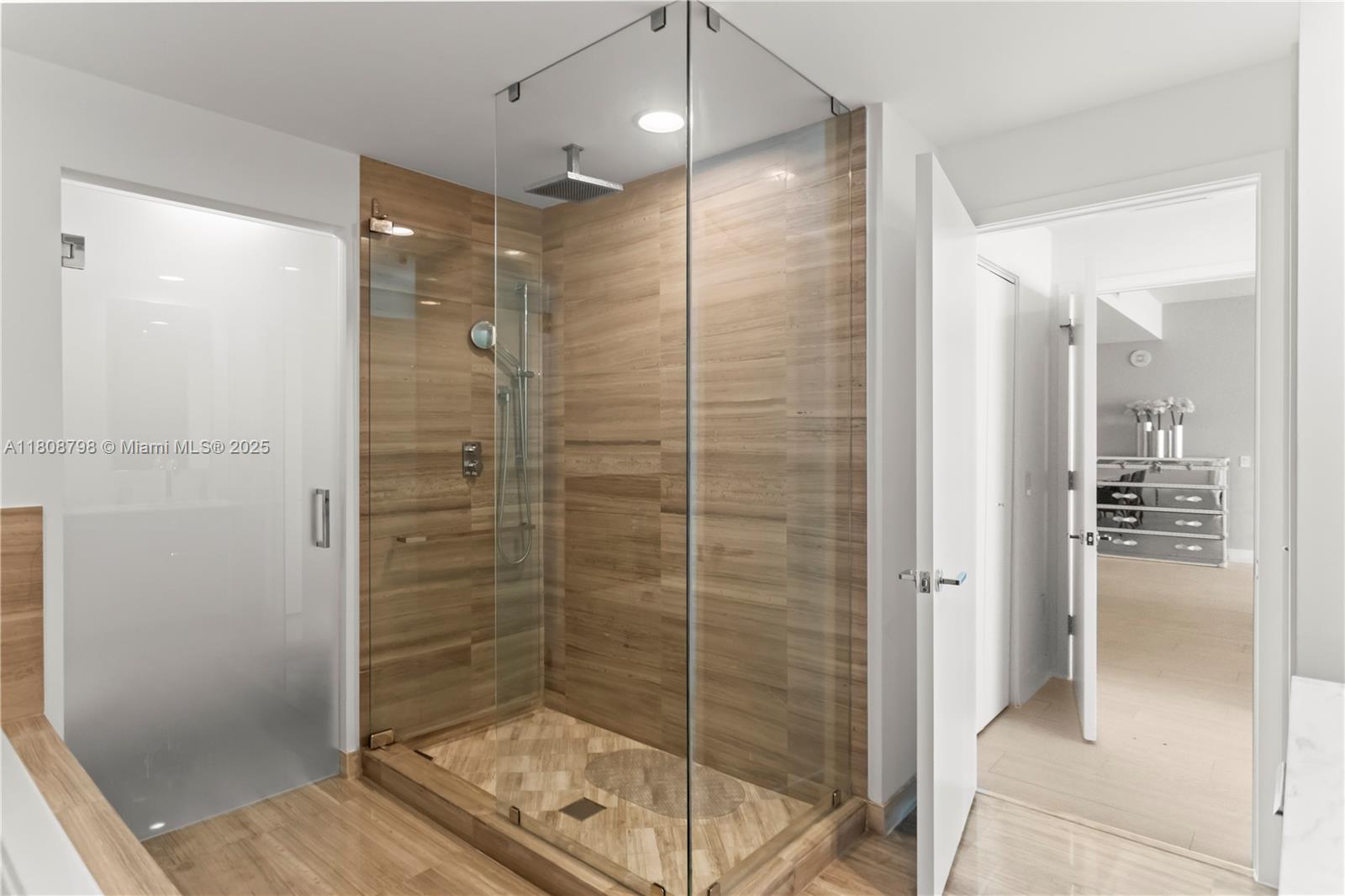 350 Ocean Drive, Unit 904N Key Biscayne, FL 33149 - Photo 27 of 41 a bathroom with a shower and a sink