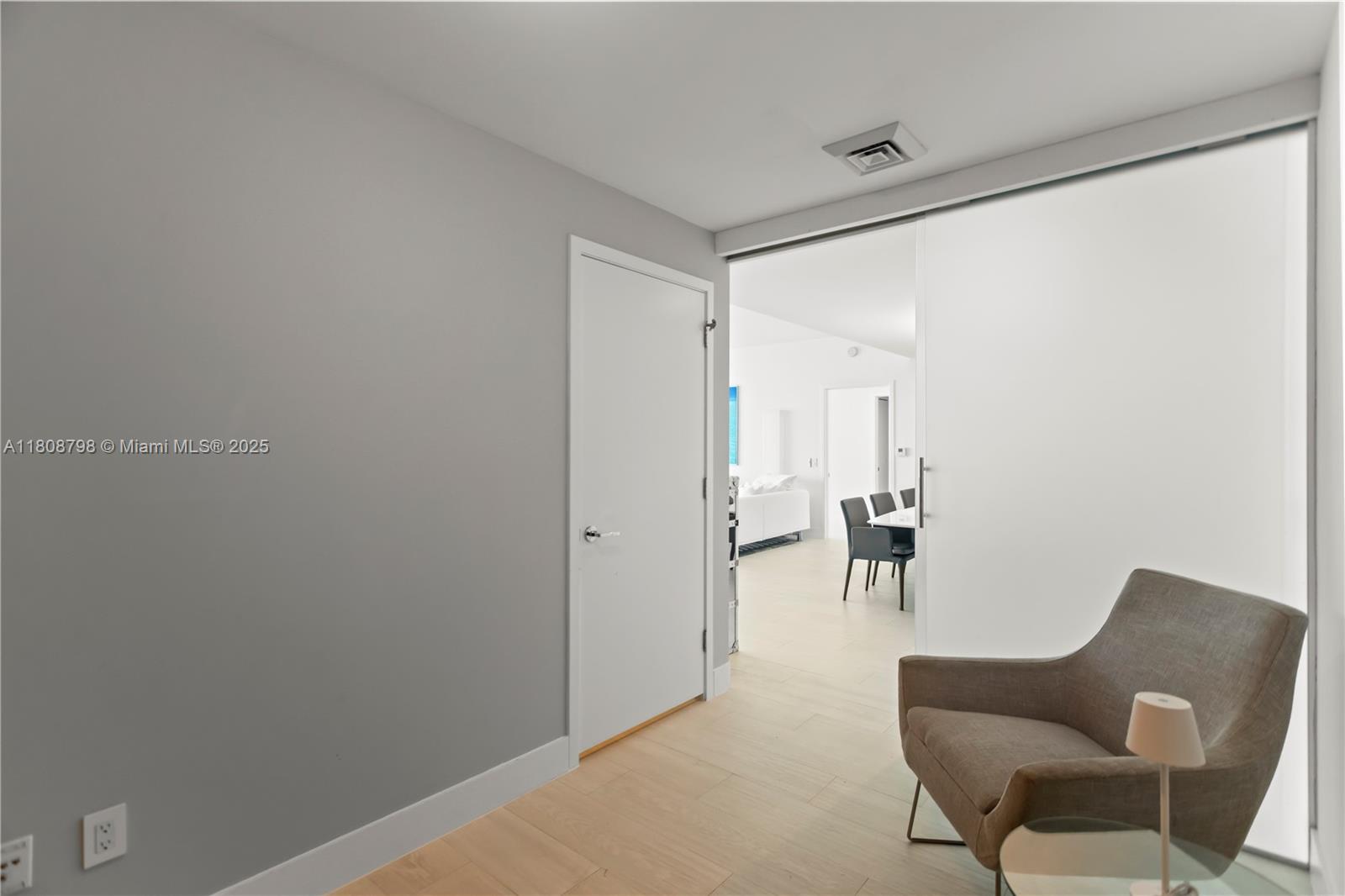 350 Ocean Drive, Unit 904N Key Biscayne, FL 33149 - Photo 36 of 41 a living room with furniture and a table