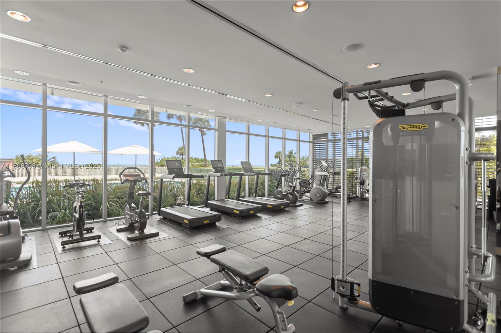 350 Ocean Drive, Unit 904N Key Biscayne, FL 33149 - Photo 41 of 41 a view of a room with gym equipment