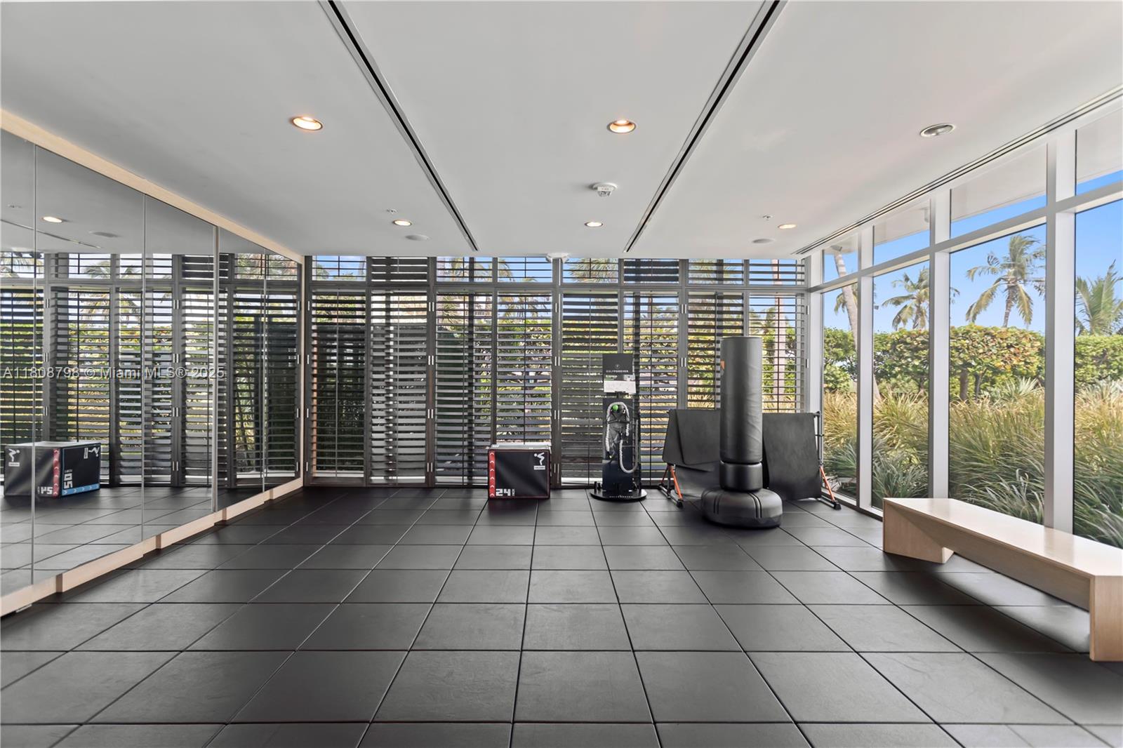 350 Ocean Drive, Unit 904N Key Biscayne, FL 33149 - Photo 9 of 41 a lobby with furniture and floor to ceiling window