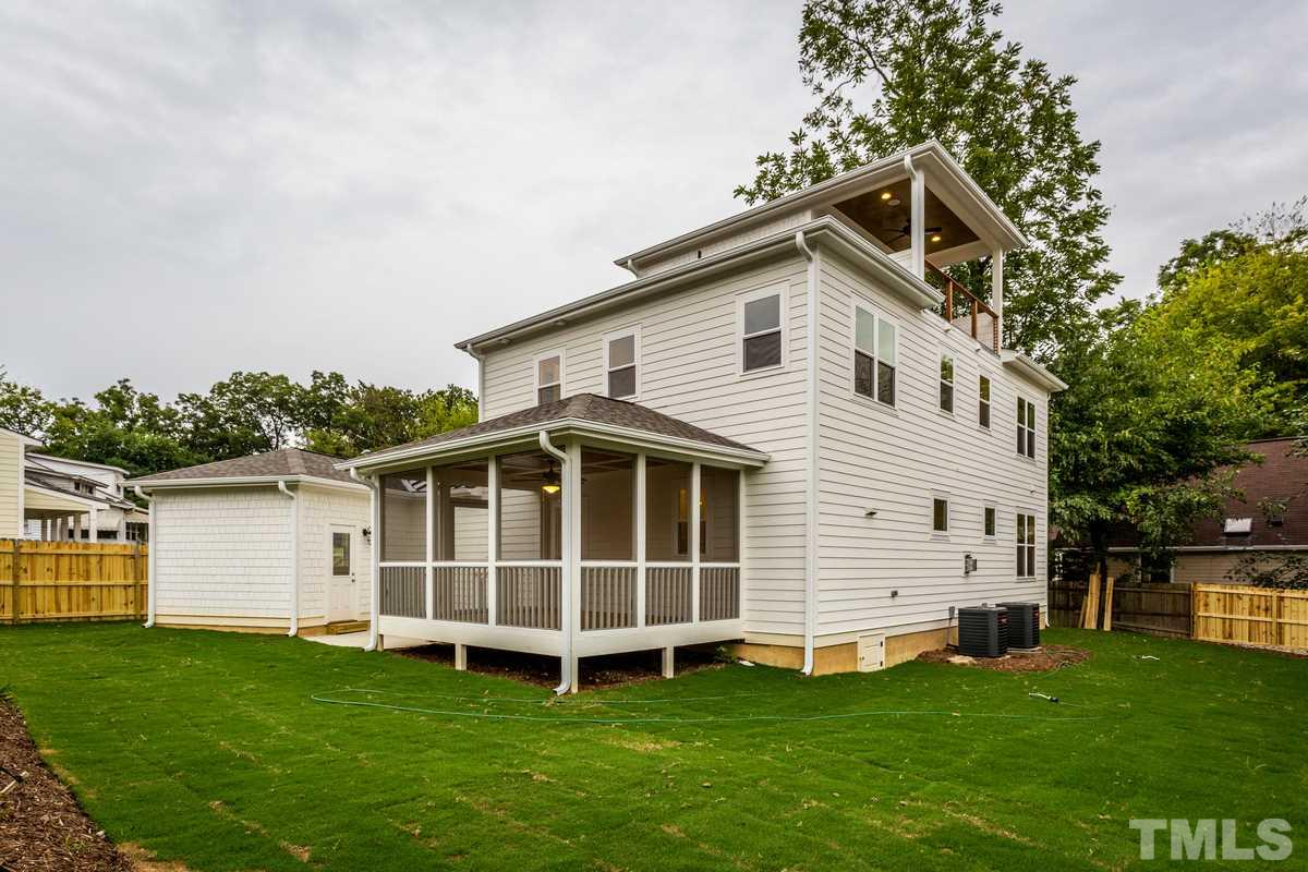 208 Bladen Street Raleigh, NC 27601 - Photo 23 of 25 a front view of a house with a garden