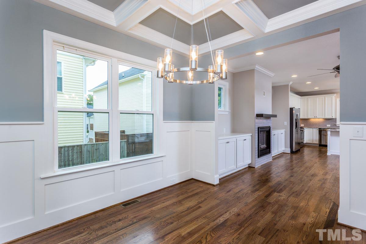 208 Bladen Street Raleigh, NC 27601 - Photo 10 of 25 a view of a living room and kitchen with a large window
