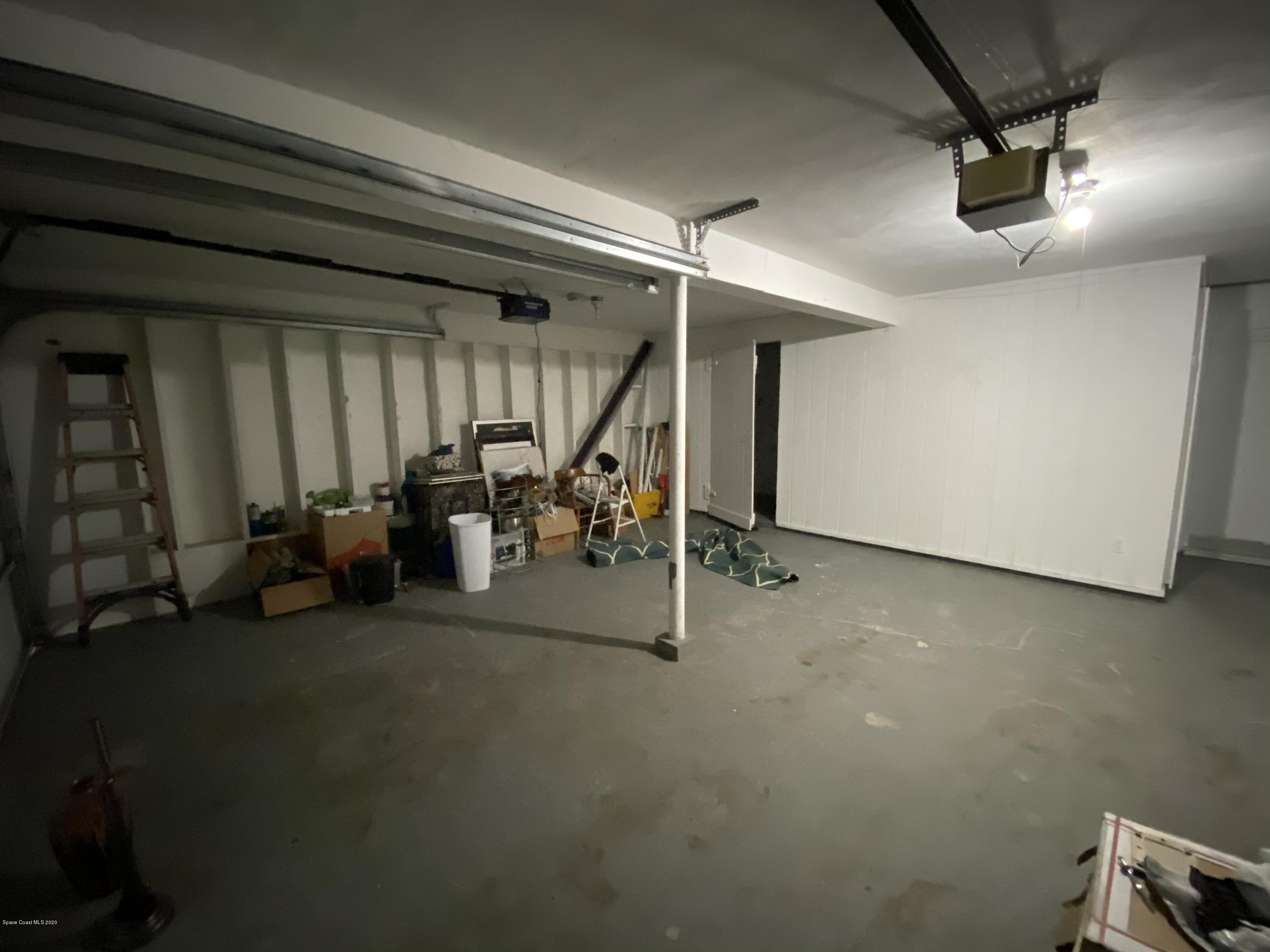 2309 Country Club Road Melbourne, FL 32901 - Photo 37 of 50 a view of a room with gym equipment