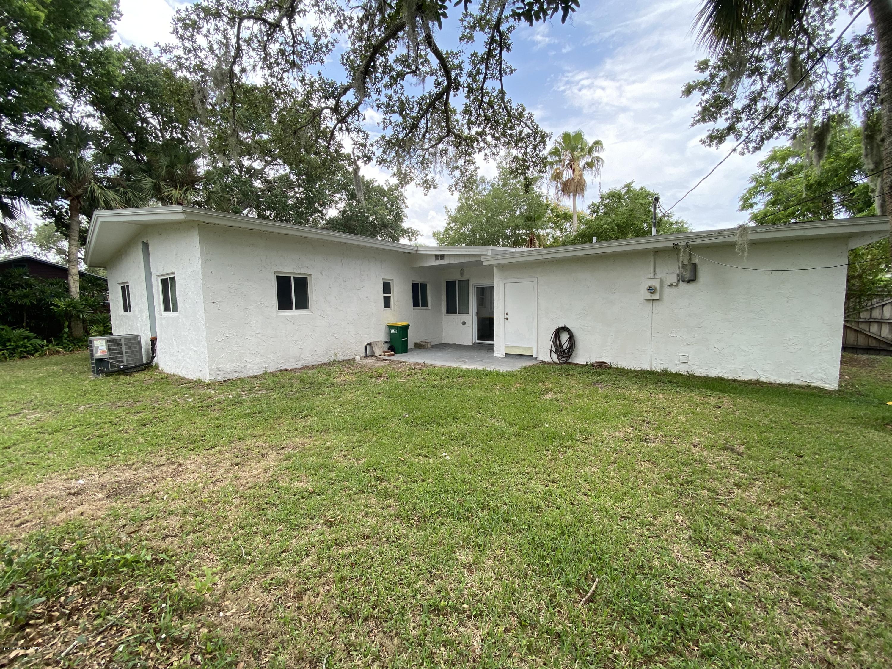 2309 Country Club Road Melbourne, FL 32901 - Photo 46 of 50 a house view with a garden space