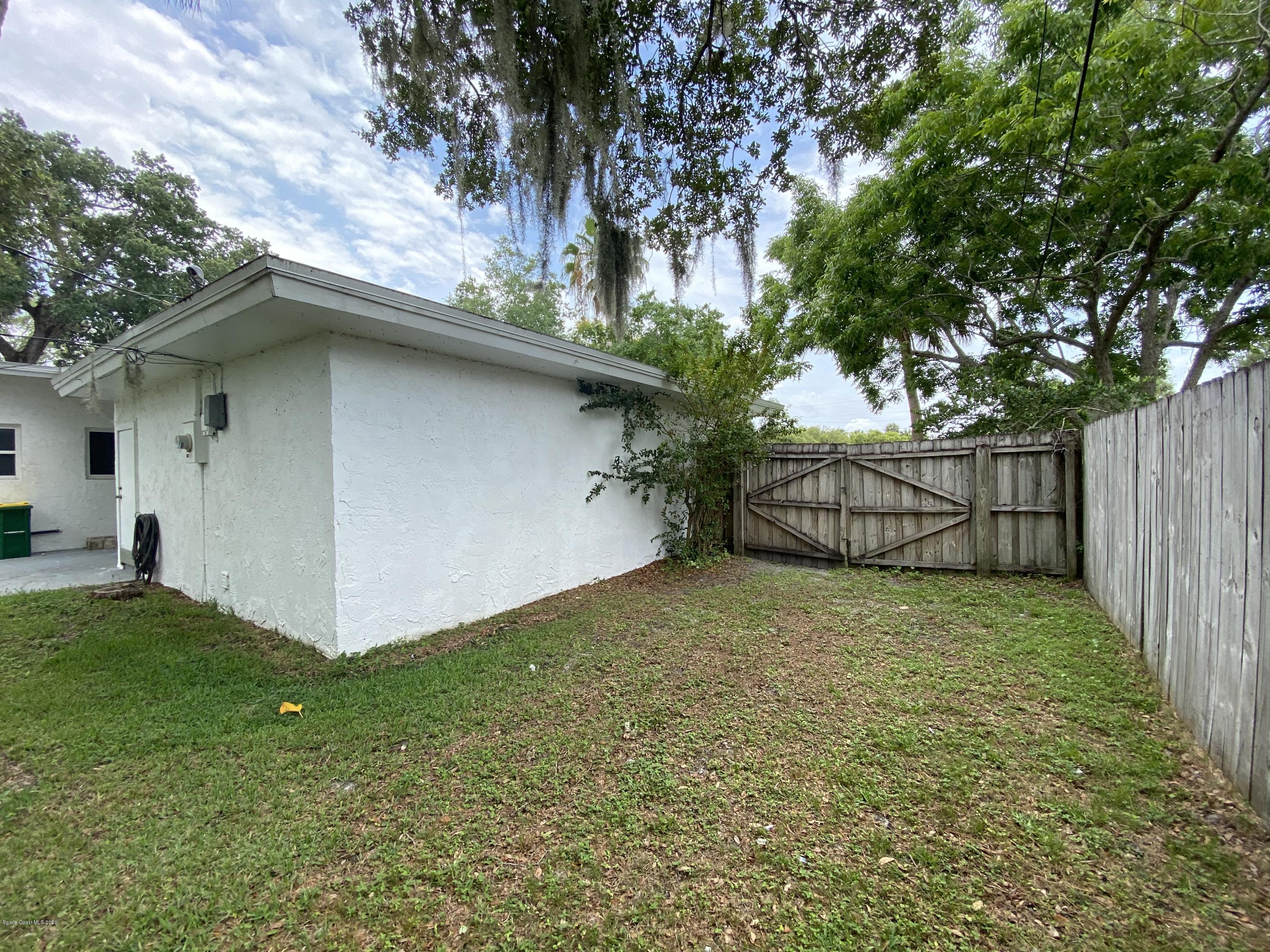 2309 Country Club Road Melbourne, FL 32901 - Photo 50 of 50 a view of backyard and tree