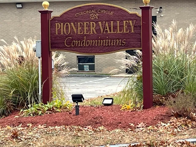 a sign on the side of a road