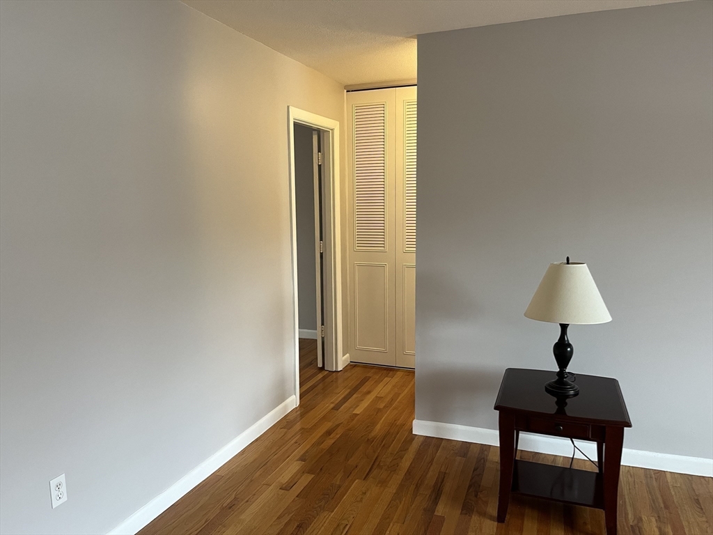 114 Colonial Circle, Unit C Chicopee, MA 01020 - Photo 7 of 16 a view of a room with a table and a chair