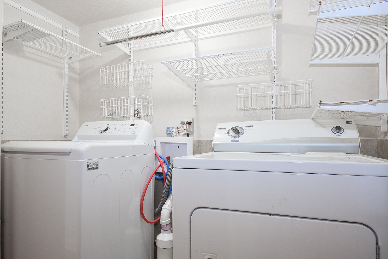 50 Ridgewood Road Elk Grove Village, IL 60007 - Photo 19 of 21 a utility room with dryer and washer