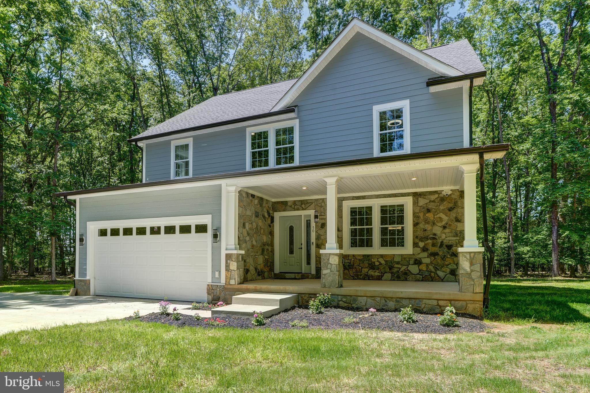 50 Retriever Court Bumpass, VA 23024 - Photo 11 of 77 a view of a house with a yard and large tree