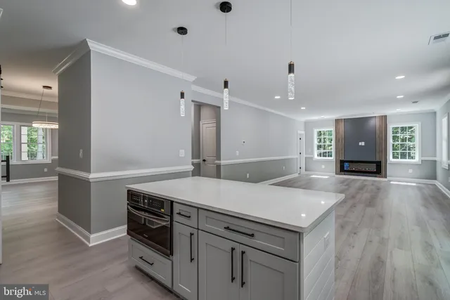 a spacious bathroom with a double vanity sink and a mirror