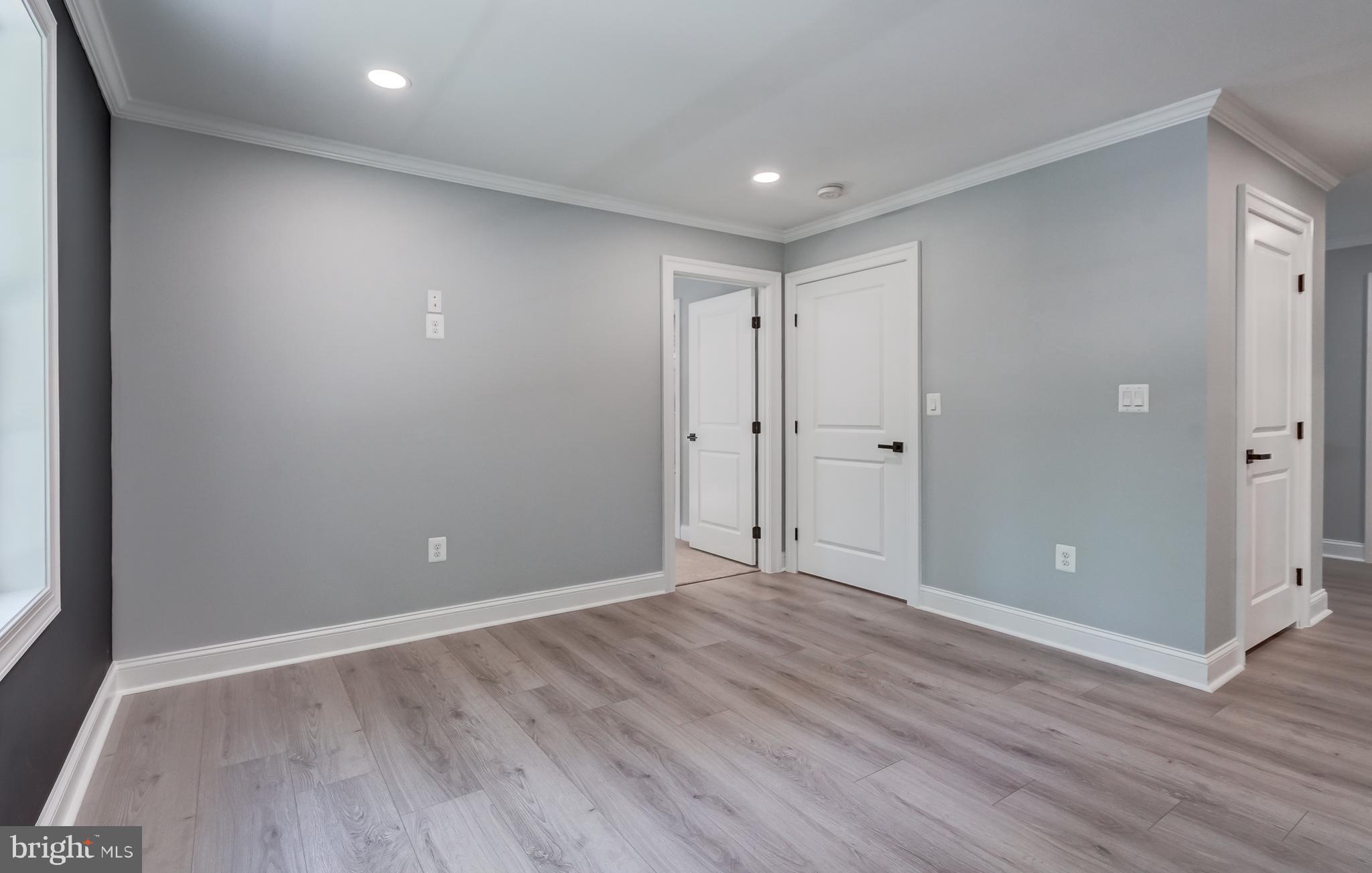 50 Retriever Court Bumpass, VA 23024 - Photo 40 of 77 a view of an empty room with wooden floor