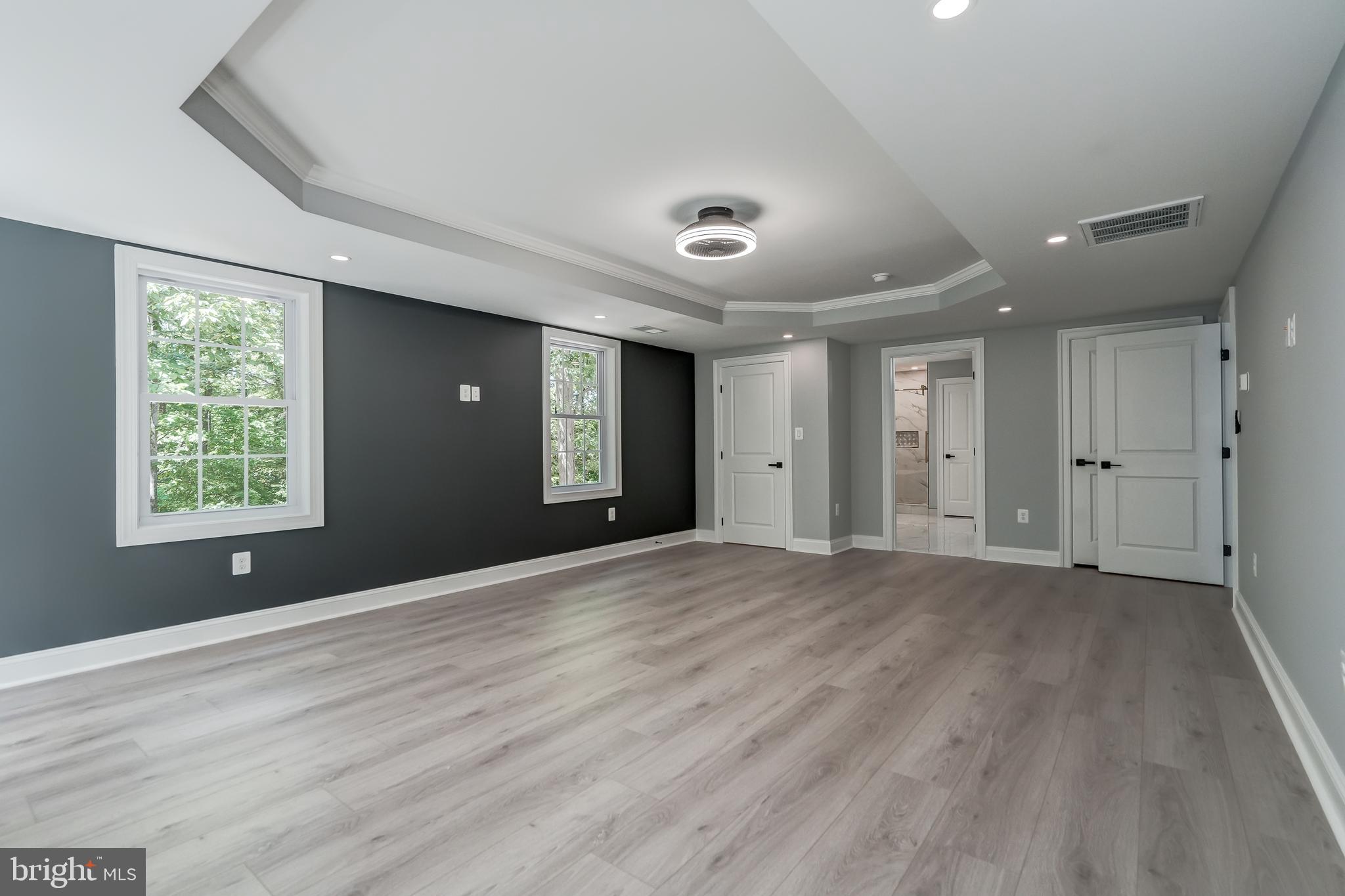 50 Retriever Court Bumpass, VA 23024 - Photo 45 of 77 a view of an empty room with wooden floor and a window
