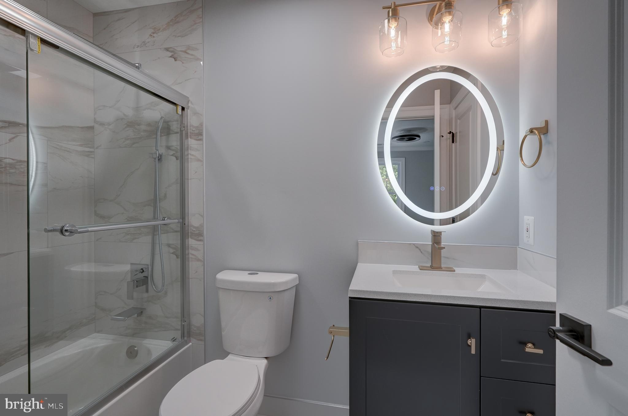 50 Retriever Court Bumpass, VA 23024 - Photo 59 of 77 a bathroom with a sink toilet and a mirror