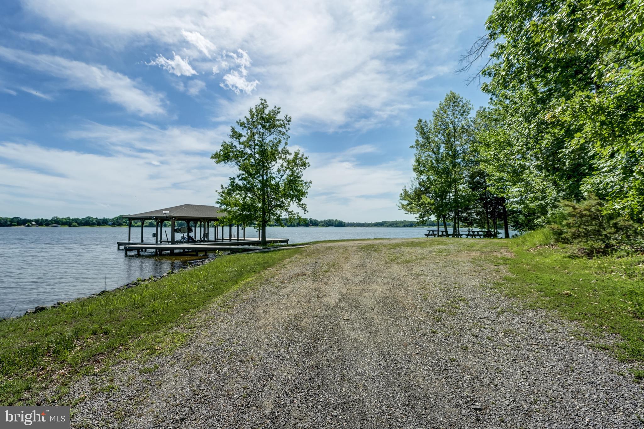 50 Retriever Court Bumpass, VA 23024 - Photo 8 of 77 a view of a lake with houses in back