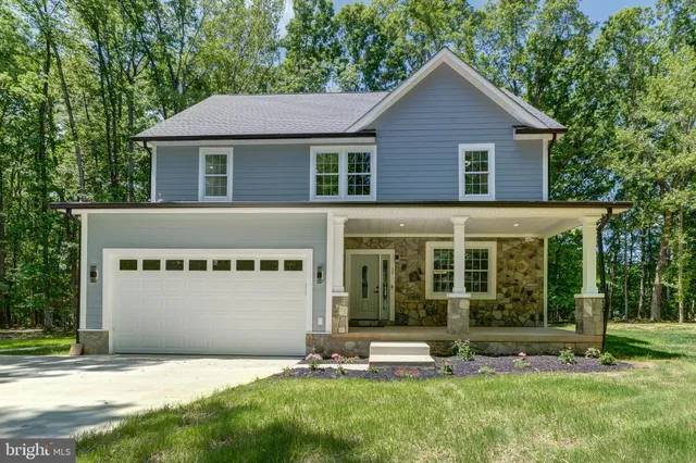 wooden floor in an empty room with a gallery