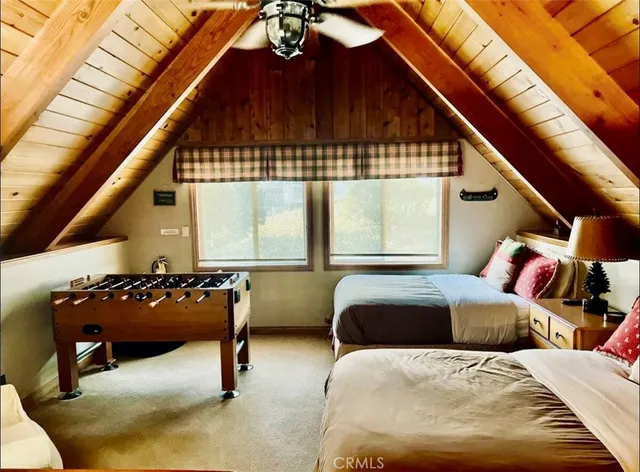 a bedroom with furniture and window