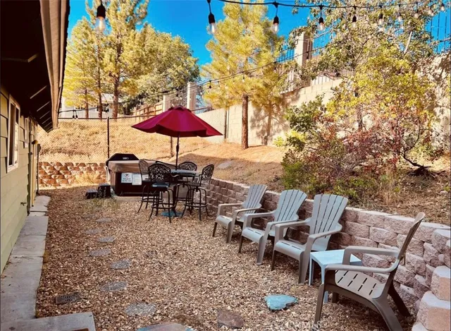 an outdoor space with patio lots of furniture