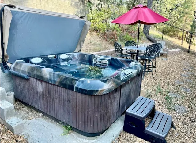 a view of a backyard of the house