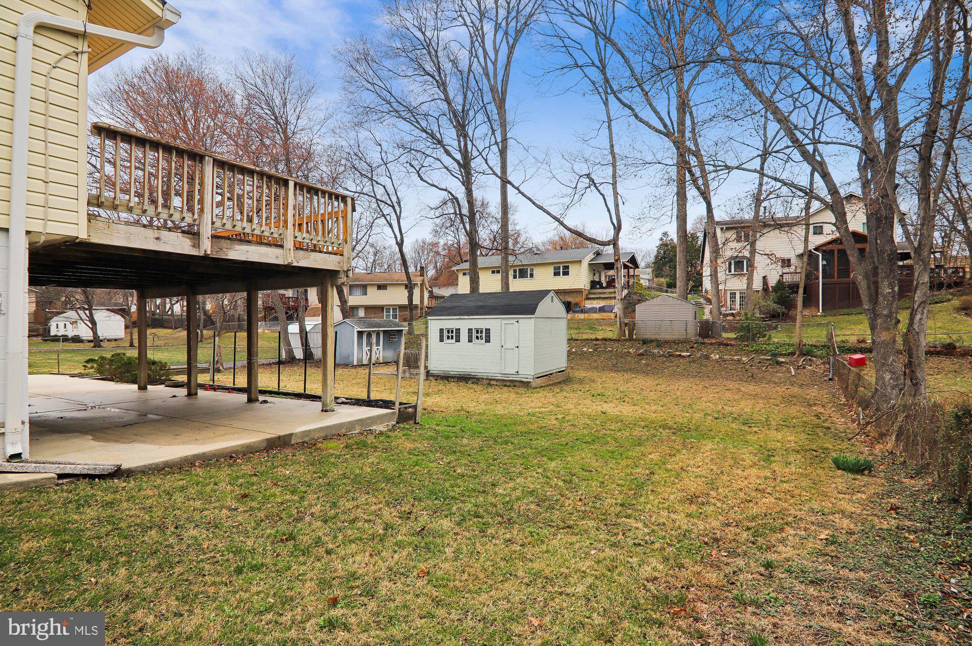 808 Johnson Avenue Silver Spring, MD 20904 - Photo 3 of 20 Spacious backyard with 2 sheds and trees.