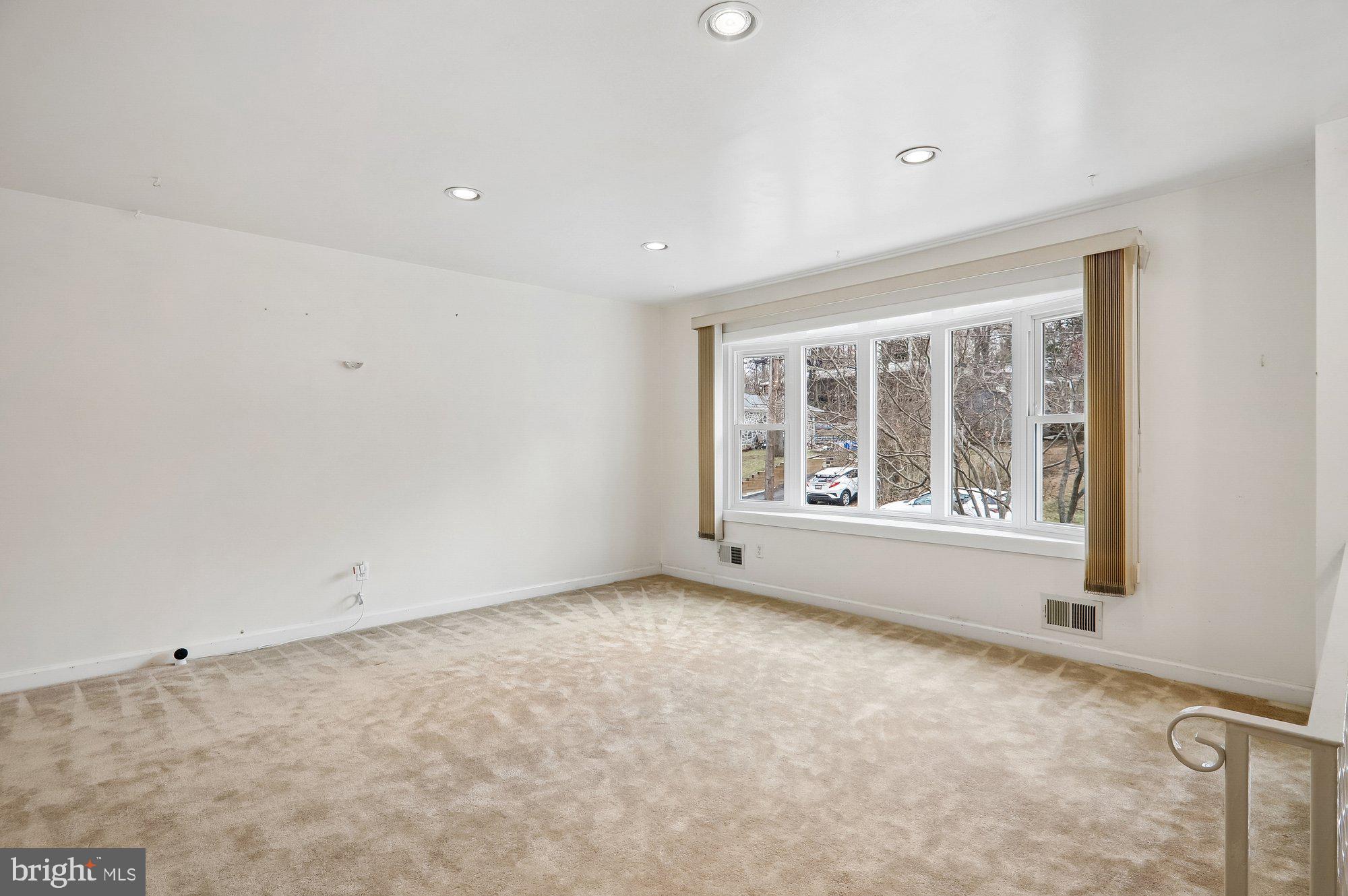 808 Johnson Avenue Silver Spring, MD 20904 - Photo 4 of 20 Bright and spacious room with large windows.