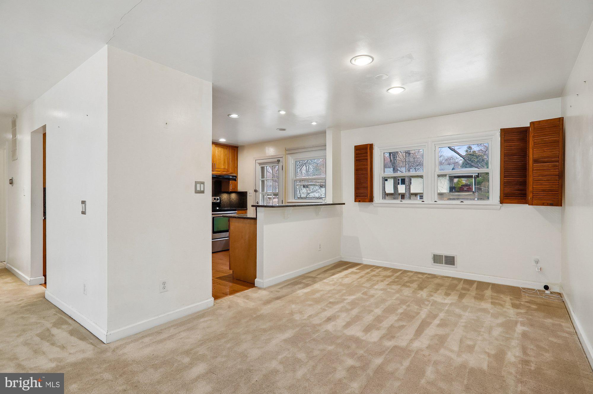 808 Johnson Avenue Silver Spring, MD 20904 - Photo 6 of 20 Bright and airy living space with cozy charm.