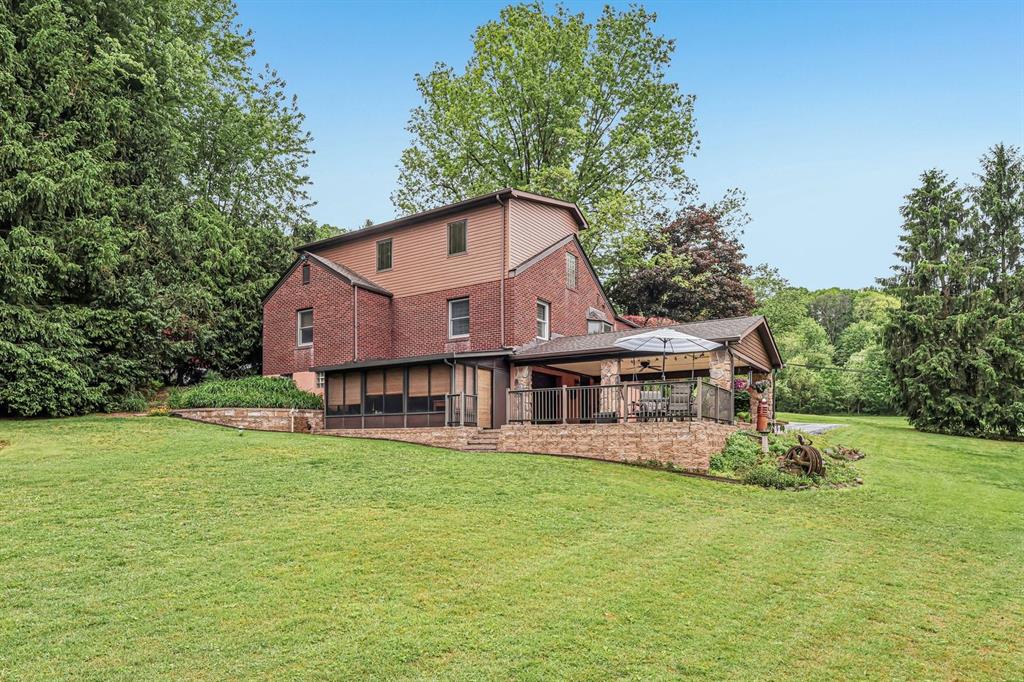 529 Utopia Road Apollo, PA 15613 - Photo 49 of 50 a front view of a house with garden