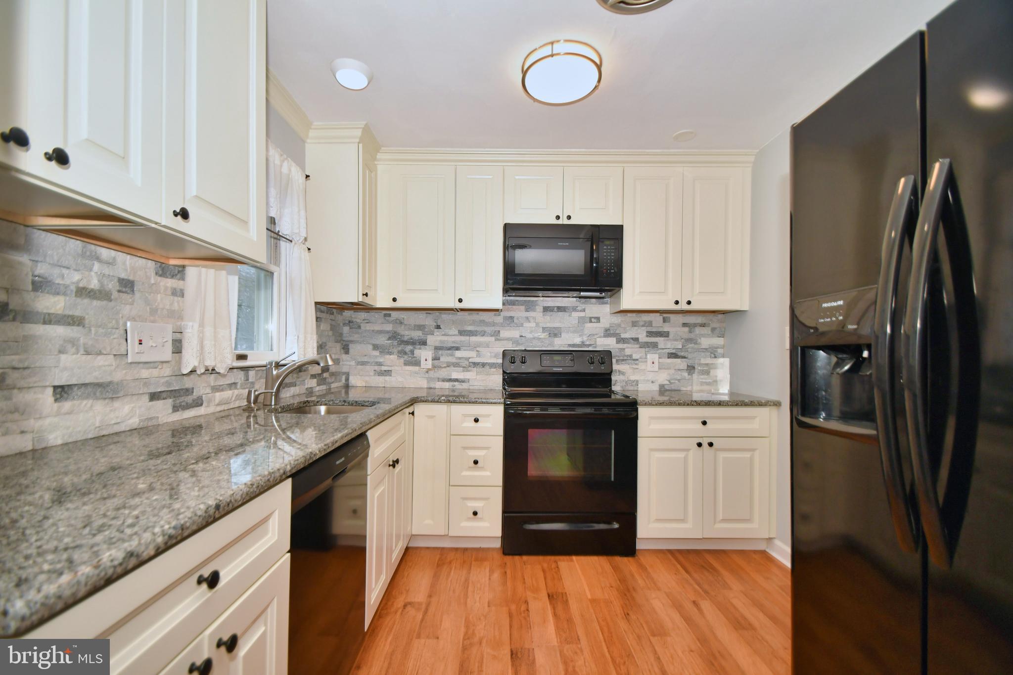 720 Falconer Road Joppa, MD 21085 - Photo 5 of 40 Brand new countertops, cabinets and appliances.