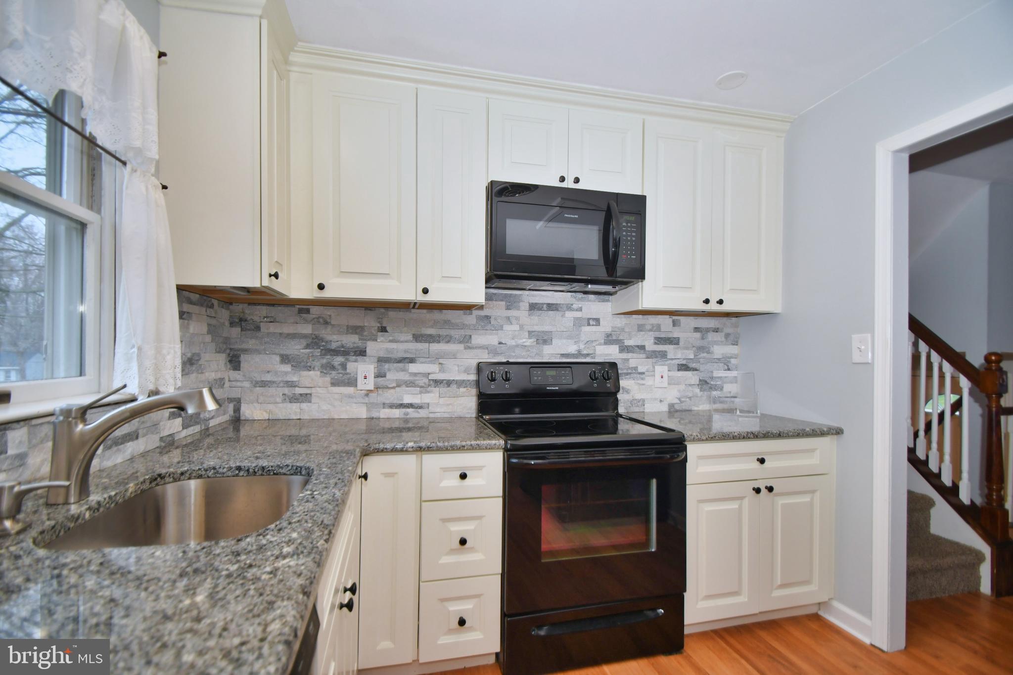 720 Falconer Road Joppa, MD 21085 - Photo 6 of 40 Beautiful tile backsplash.