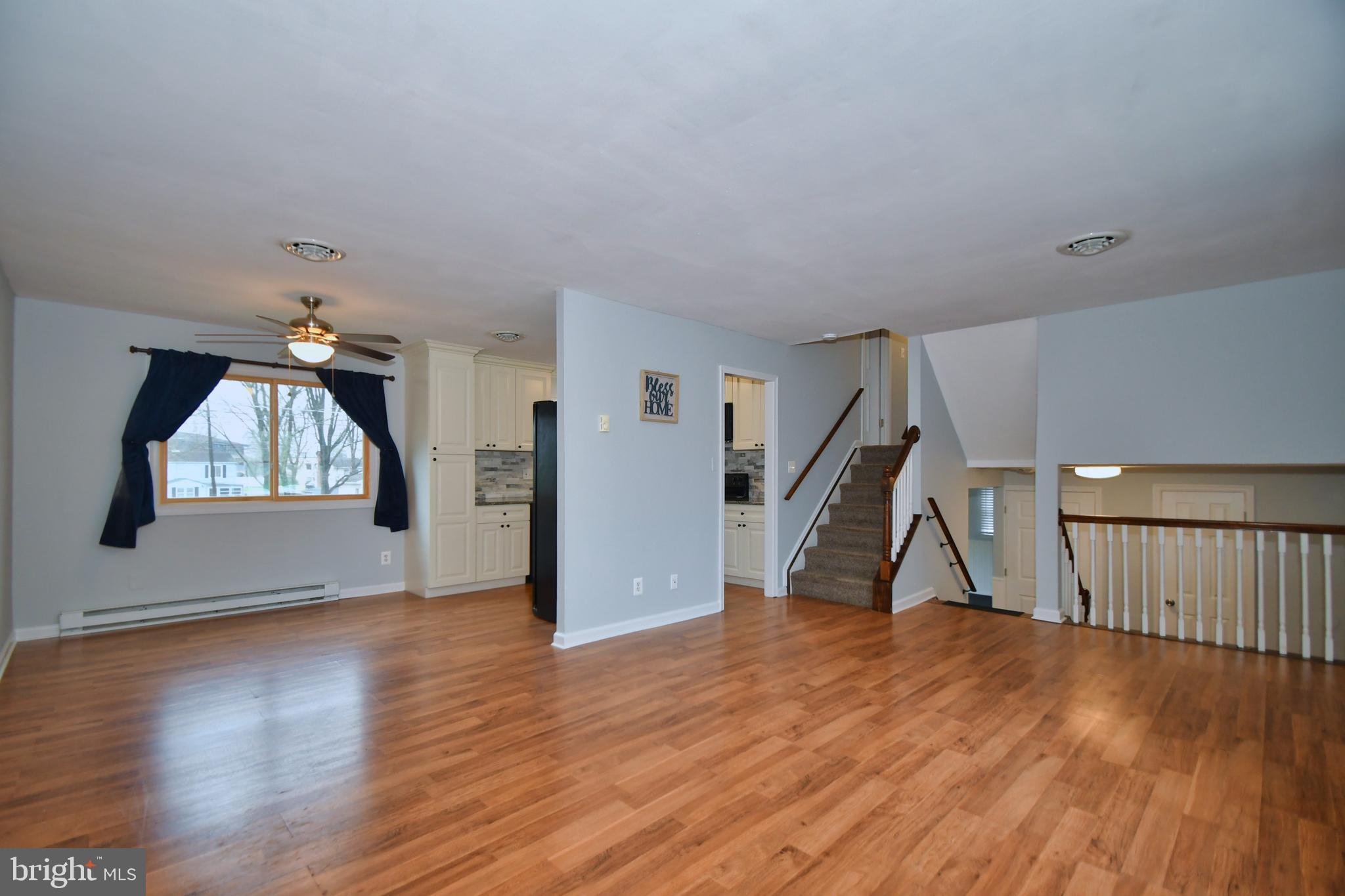 720 Falconer Road Joppa, MD 21085 - Photo 8 of 40 Dining room opens into a large living space.