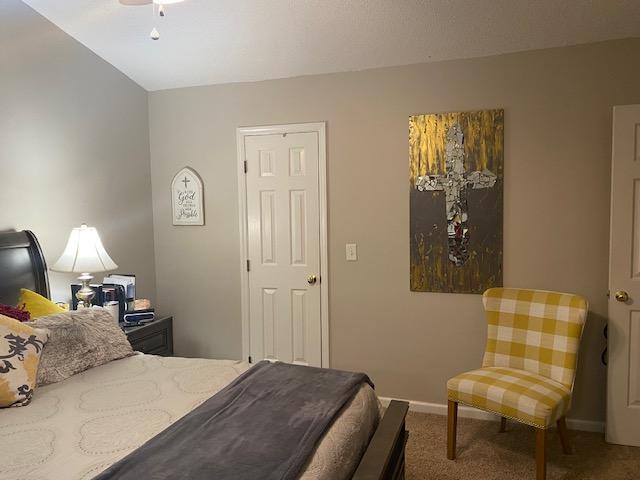 109 Tabula Place Cary, NC 27513 - Photo 14 of 26 a bedroom with a bed and a couch