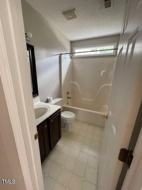109 Tabula Place Cary, NC 27513 - Photo 22 of 26 a bathroom with a double vanity sink toilet and shower