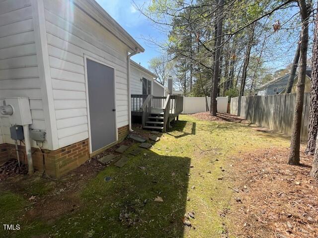 109 Tabula Place Cary, NC 27513 - Photo 24 of 26 a view of a yard with wooden fence