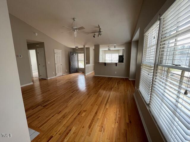 109 Tabula Place Cary, NC 27513 - Photo 4 of 26 a view of a room with wooden floor and windows