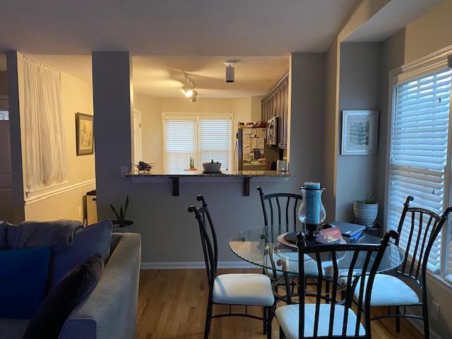 109 Tabula Place Cary, NC 27513 - Photo 7 of 26 a view of a dining room with furniture and window
