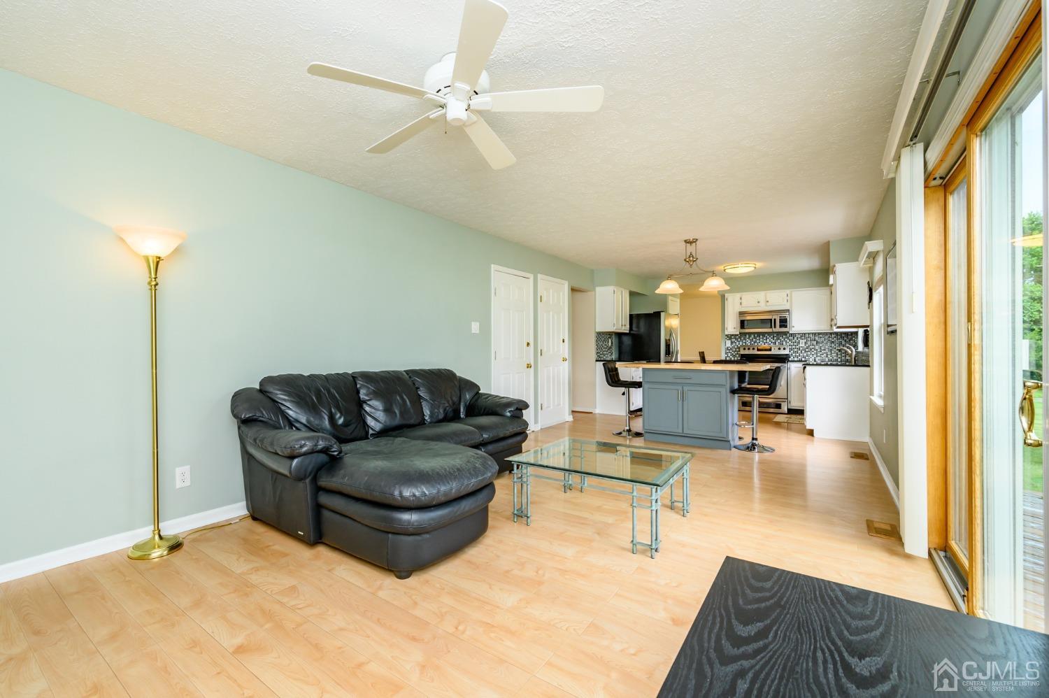 709 Henderson Road Lumberton, NJ 08048 - Photo 16 of 46 a living room with furniture and a large window